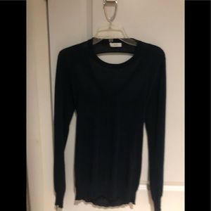 Long sleeve dark blue sweater.